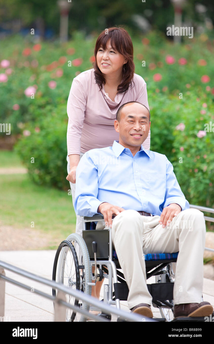 Woman pushing man away park hi-res stock photography and images - Alamy