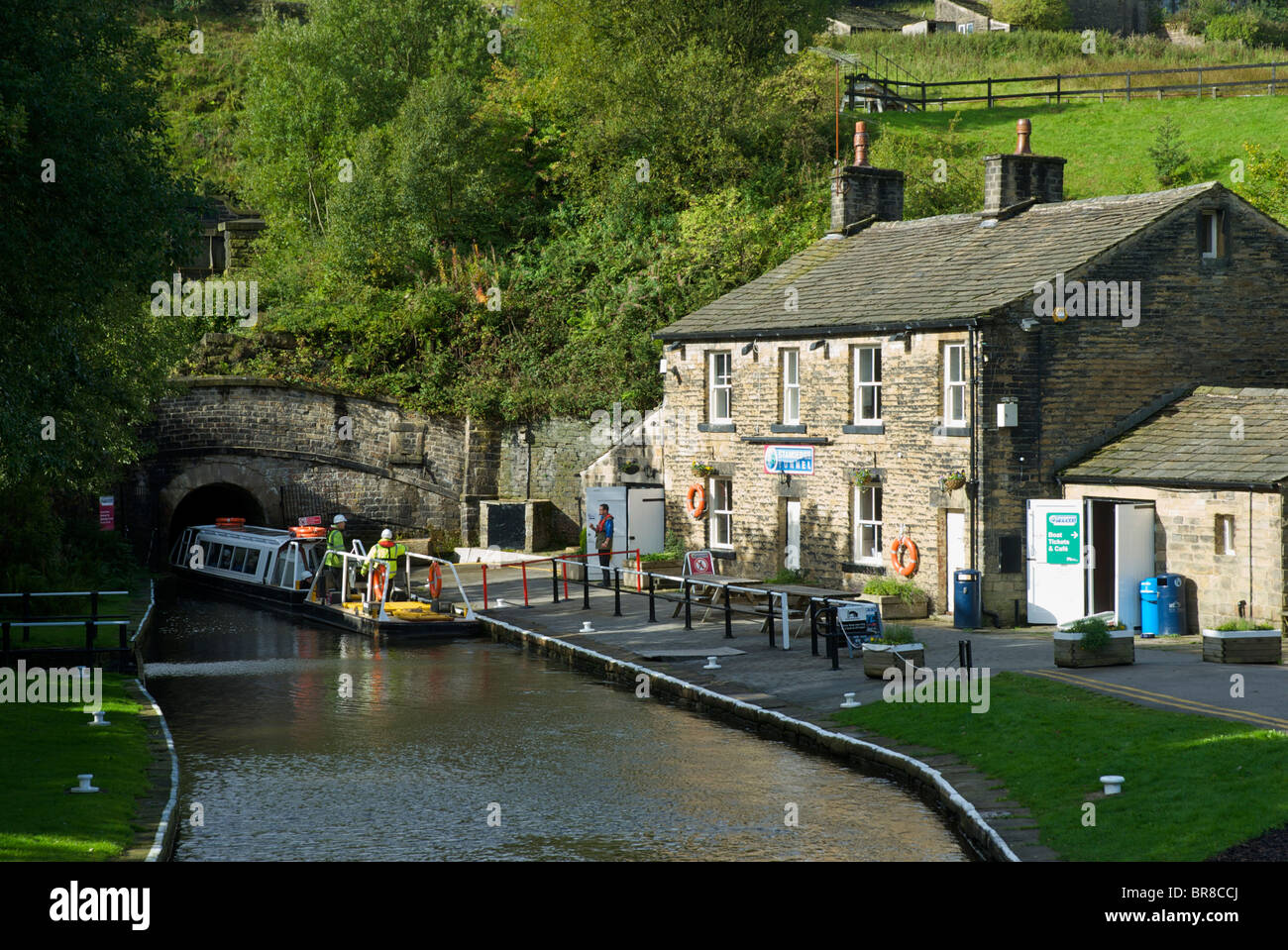 Narrowboat entering Standedge Tunnel on Huddersfield Narrow Canal, Tunnel End, near Marsden, West Yorkshire, England UK Stock Photo