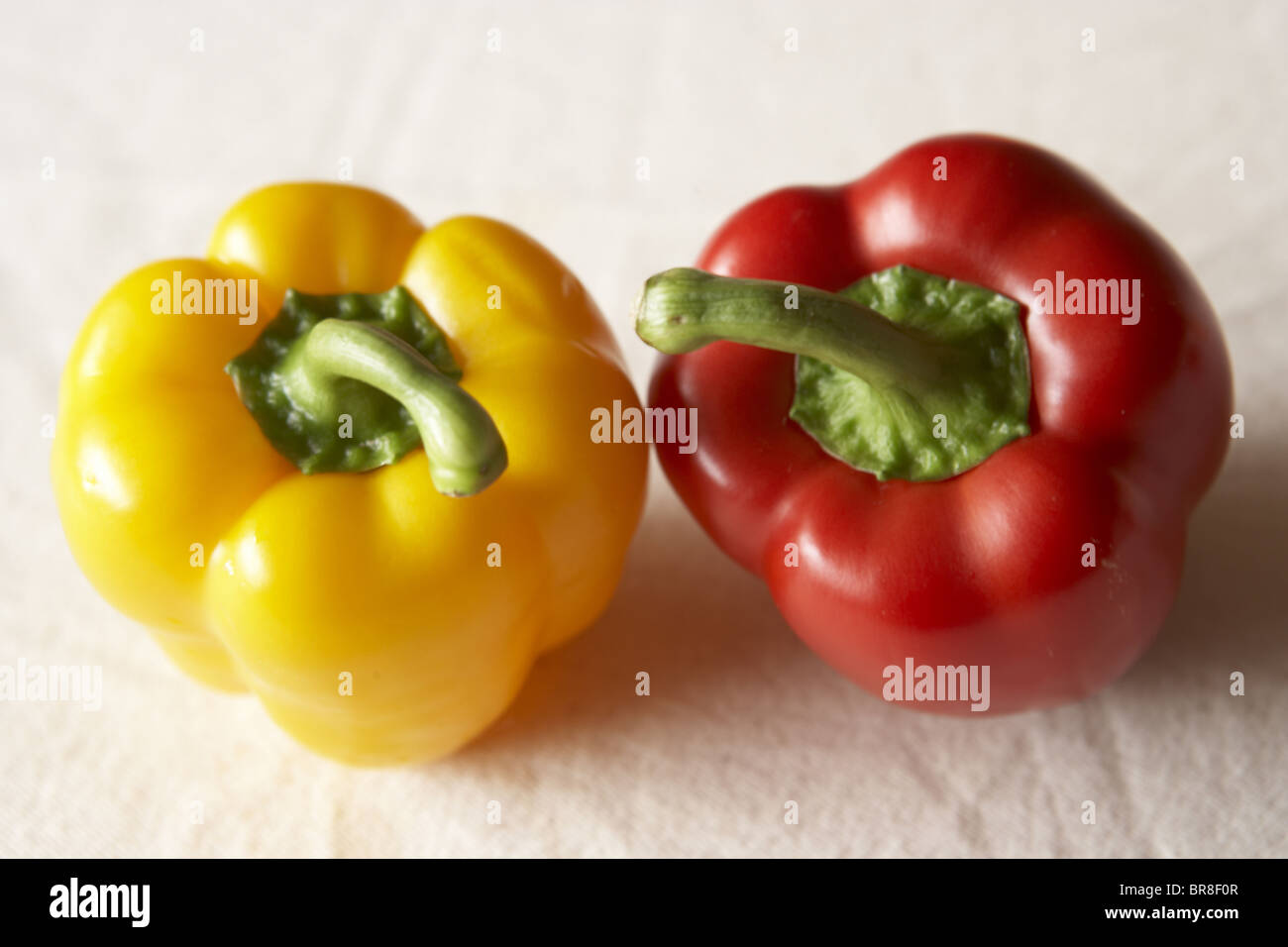 Red and yellow bell peppers, close up, white background Stock Photo - Alamy