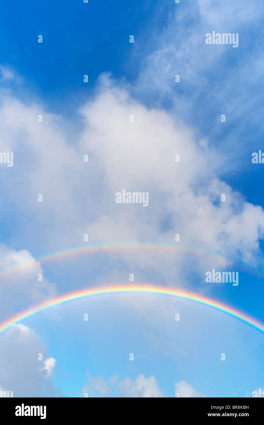 Double Rainbow in the Blue Sky Stock Photo - Alamy