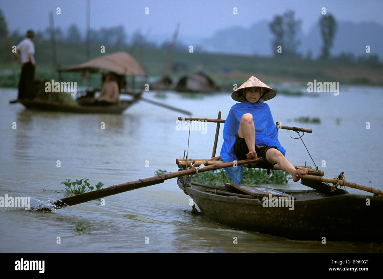 Woman rowing with feet hi-res stock photography and images - Alamy