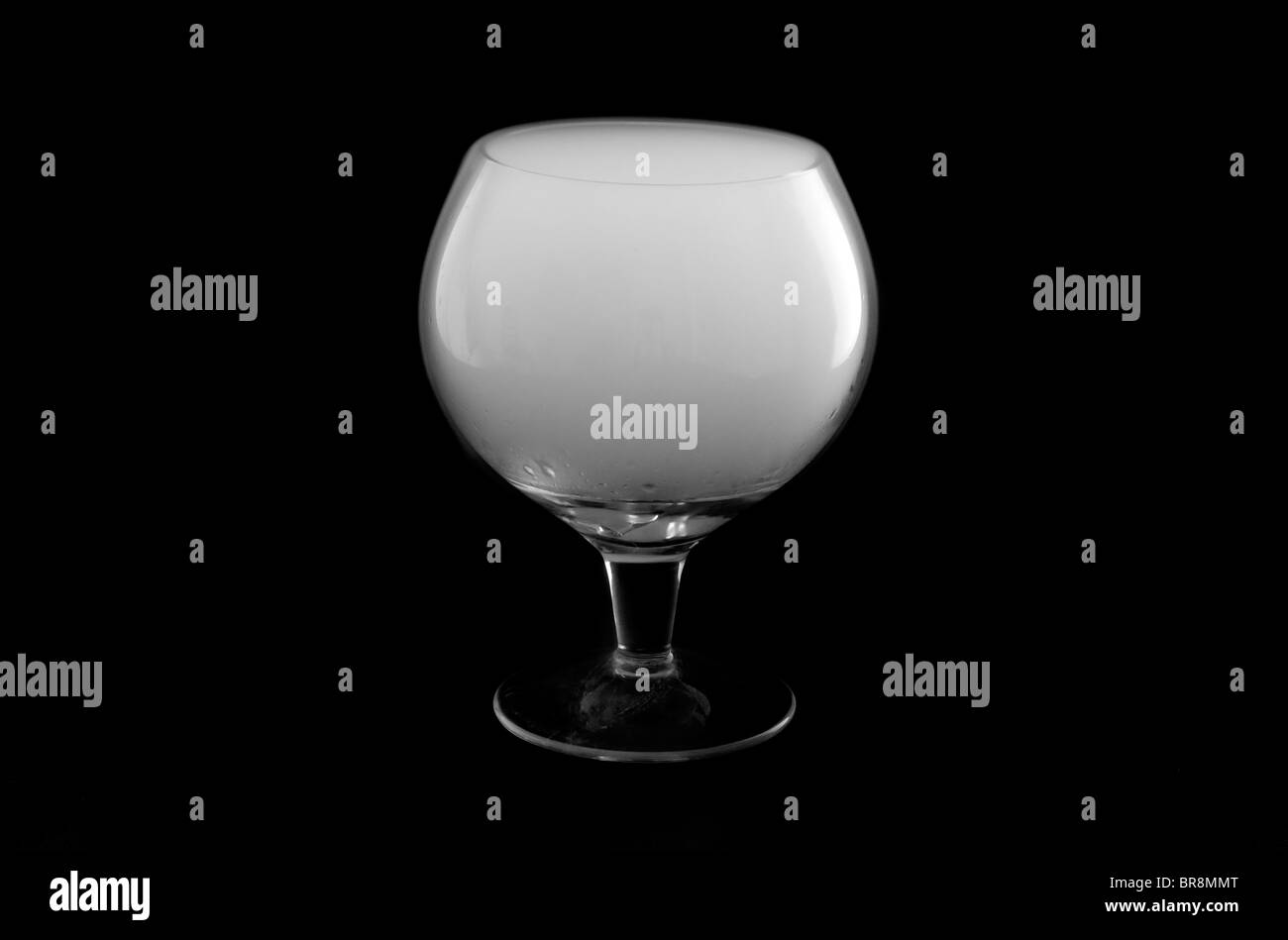 cognac glass filled with white vapor Stock Photo