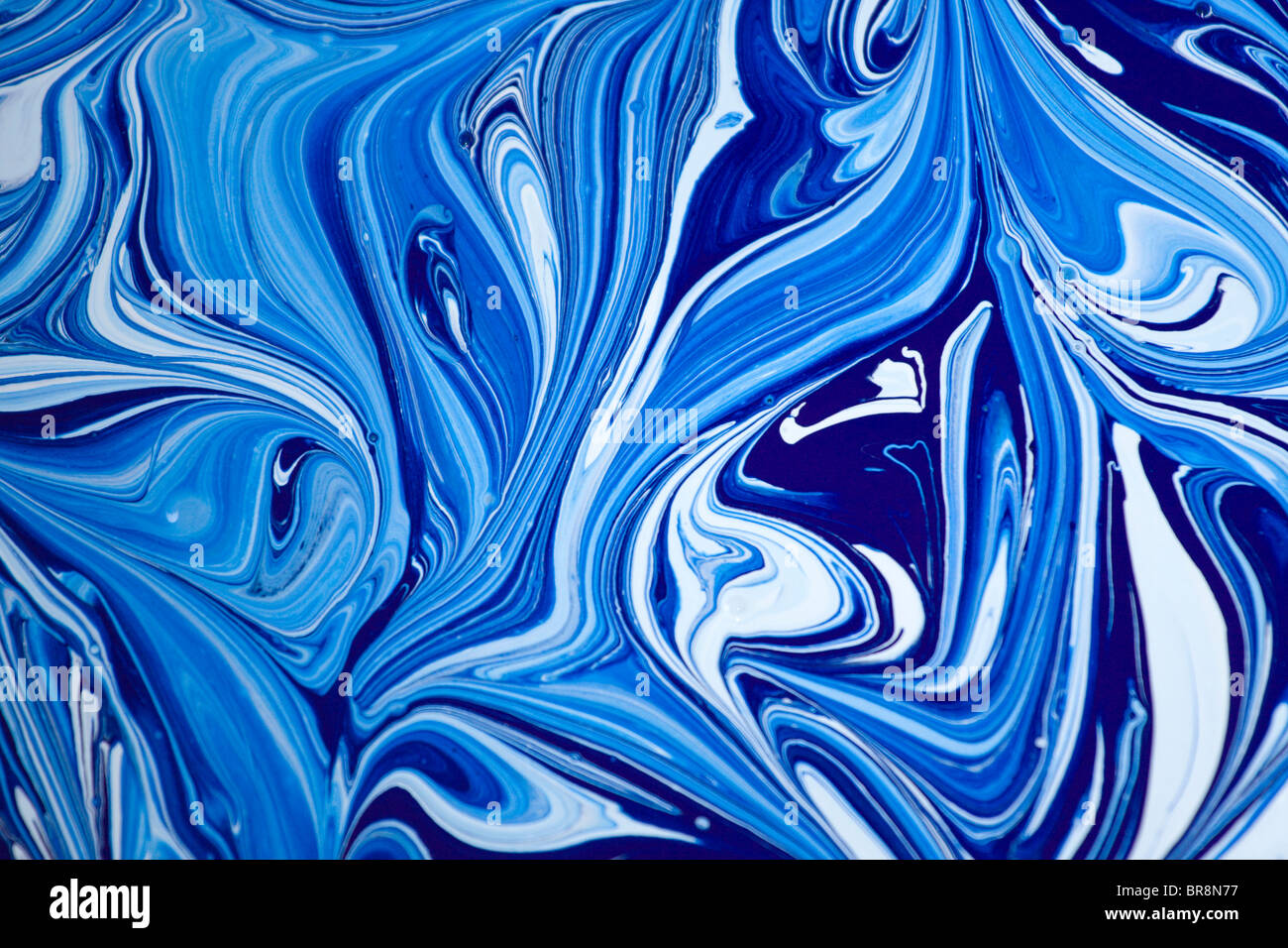 Abstract curves of mixing colors. Stock Photo