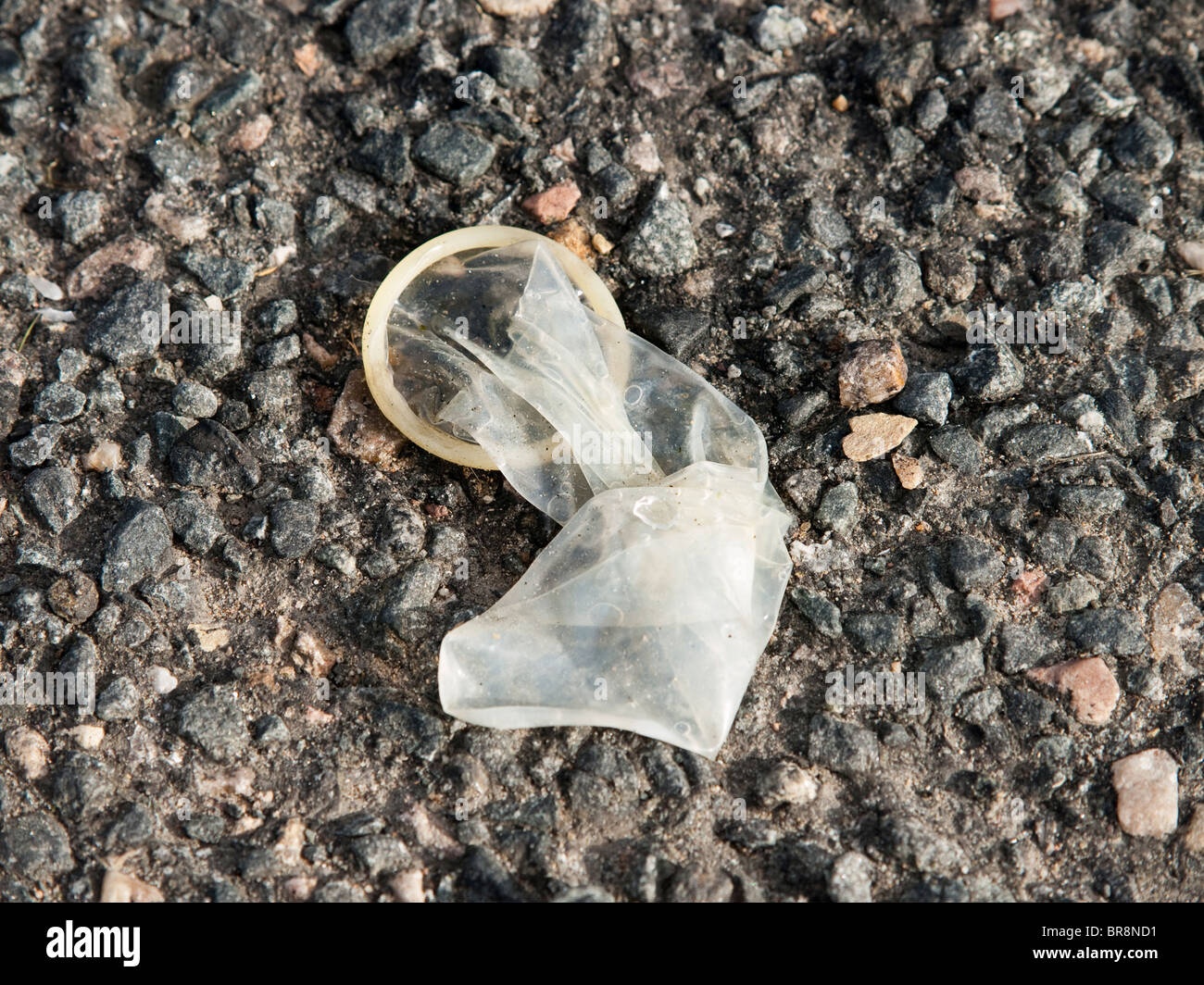 Discarded condom Stock Photo