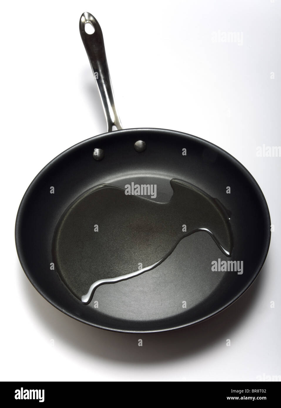 Oil in a frying pan Stock Photo Alamy