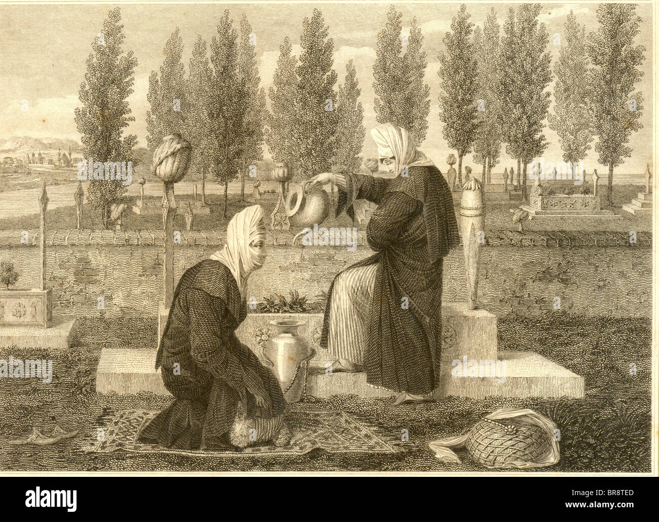 Women tending grave in Turkish Burying Ground Stock Photo