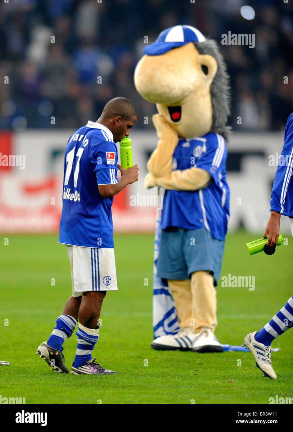 Jefferson Farfan and Erwin the mascot of Schalke, frustrated after the match. Stock Photo