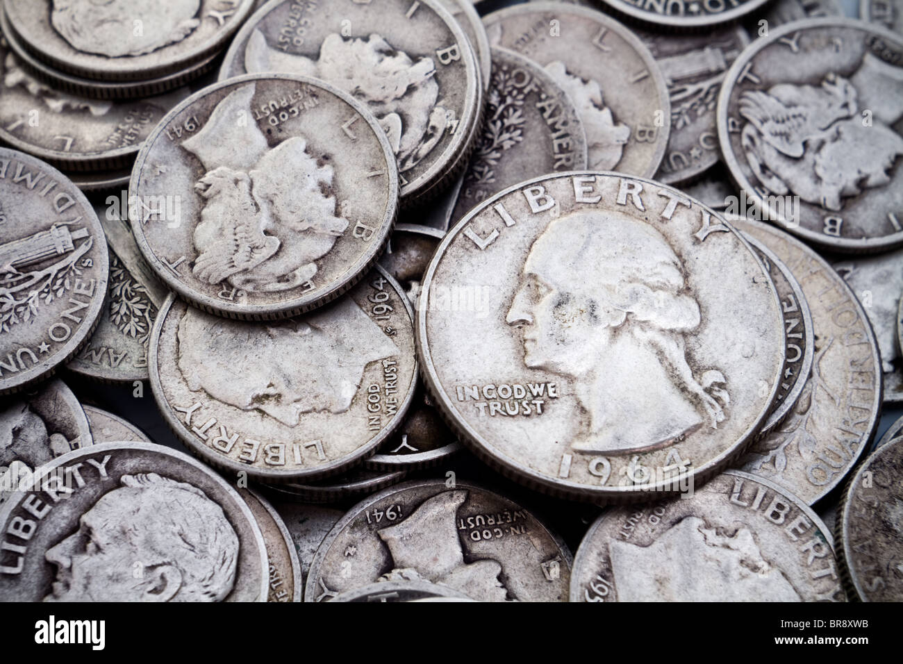 A pile of USA 90% silver content coins. Good for collectible or bullion themes. Stock Photo