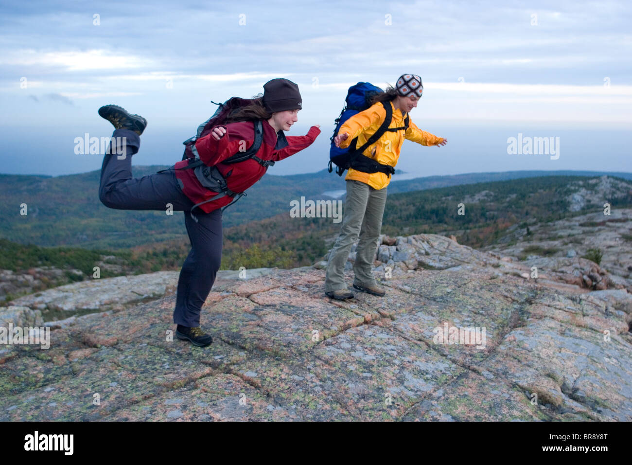 Two young women hiking in Acadia National Park. Bar Harbor Maine Stock