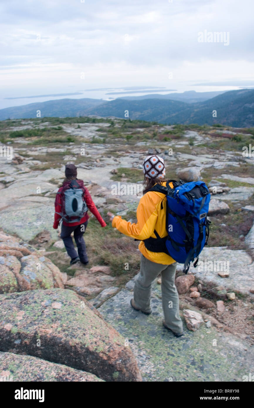Two young women hiking in Acadia National Park. Bar Harbor Maine Stock