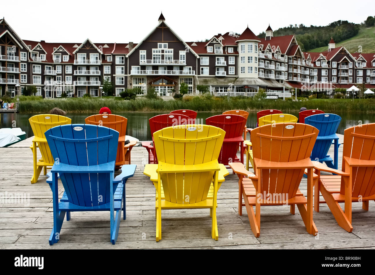 colorful colourful muskoka chair chairs cottage Stock Photo Alamy