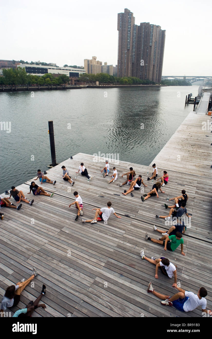 Teenagers attend a youth rowing program in Manhattan New York. Stock Photo