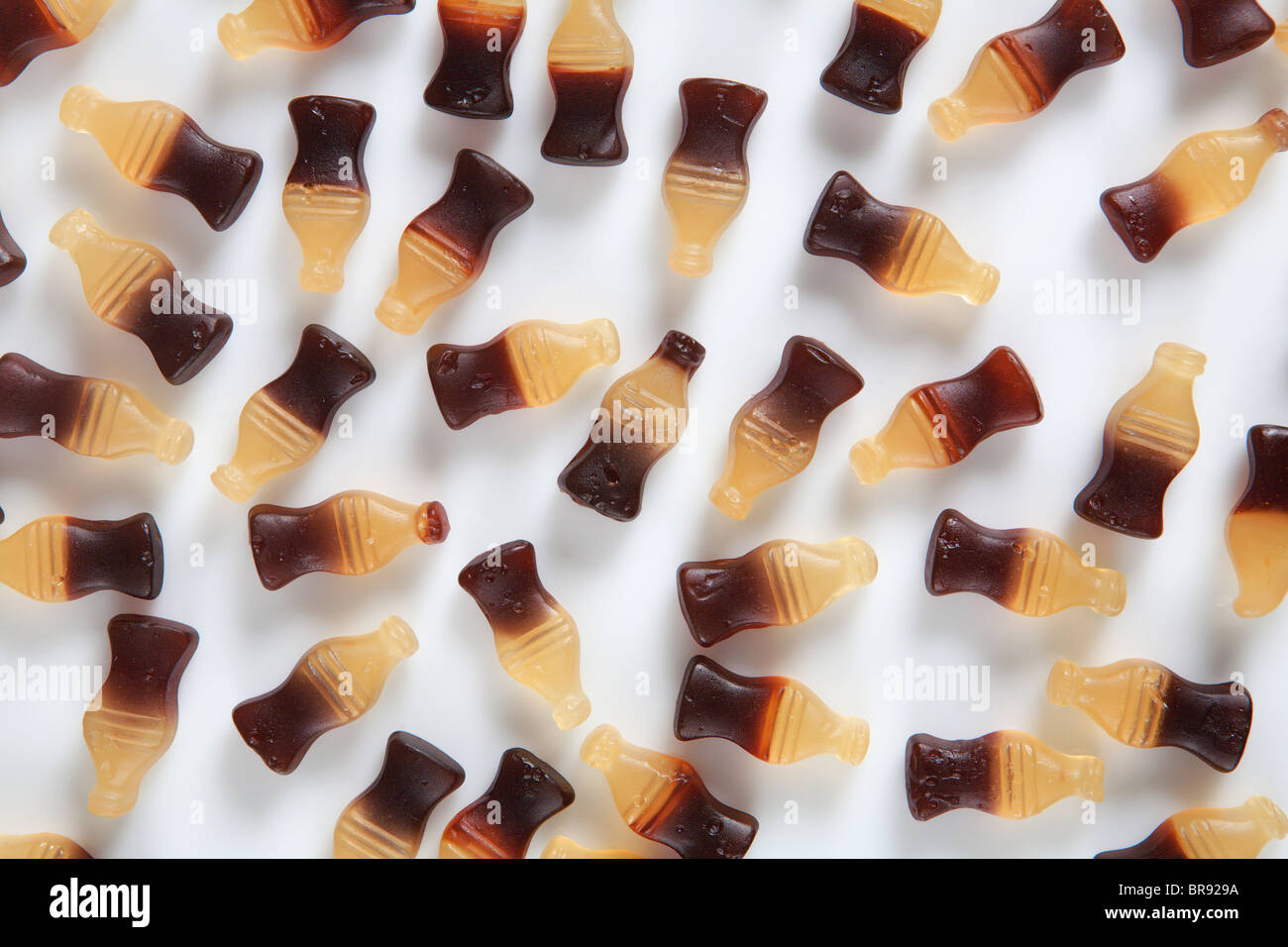 cola bottle sweets on white back ground Stock Photo Alamy