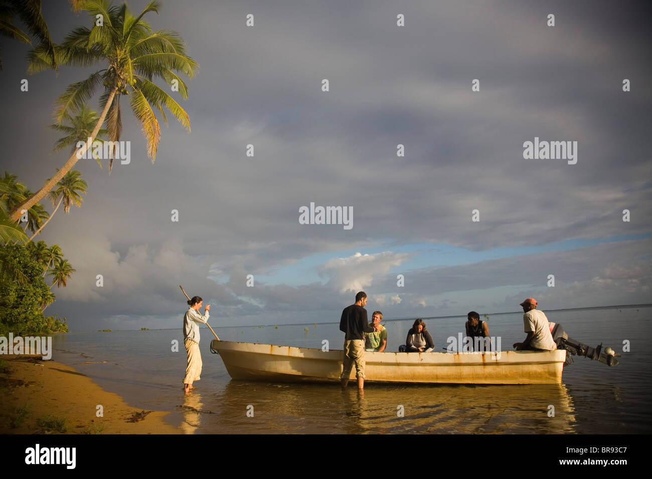 Dr. Sharyn Jones stands near a boat on her National Geographic Research and Exploration Grant in Fiji. Stock Photo