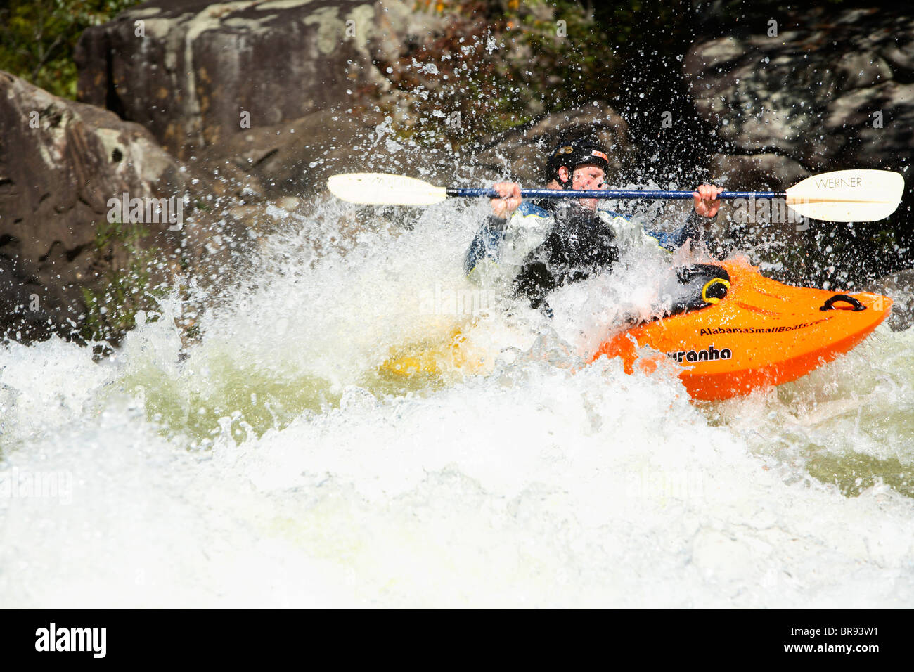 Unknown kayaker punches through Pillow Rock rapid on the Upper Gauley river near Fayetteville WV Stock Photo