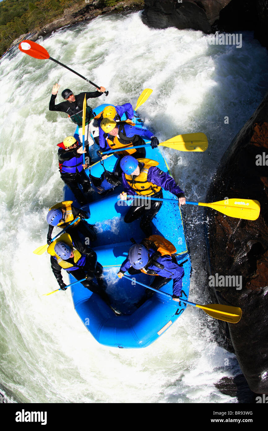 Unknown rafters roll through the infamous Pillow Rock rapid on the Upper Gauley River near Fayetteville WV Stock Photo