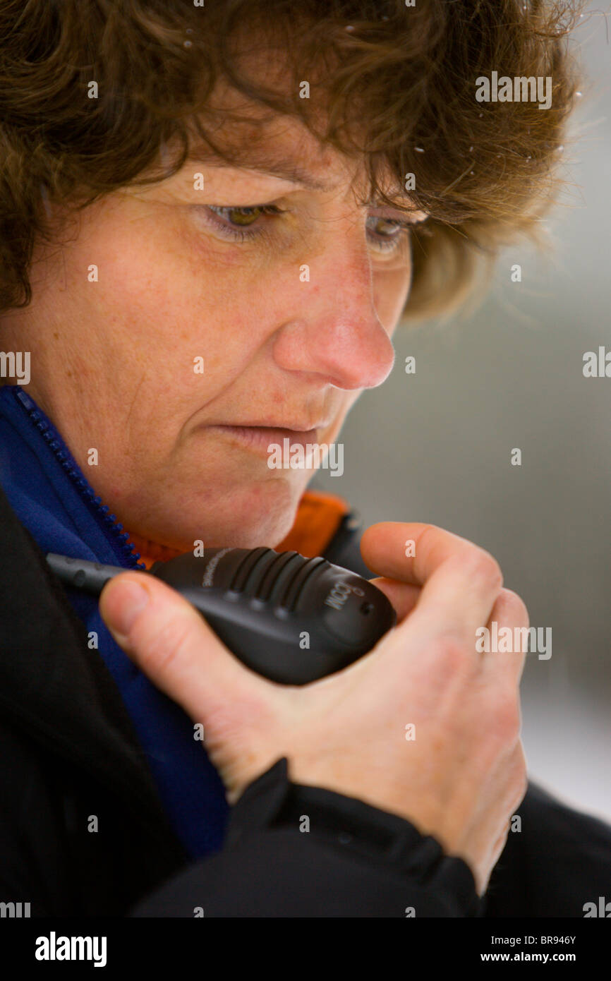 Search and Rescue worker making a radio call Stock Photo Alamy