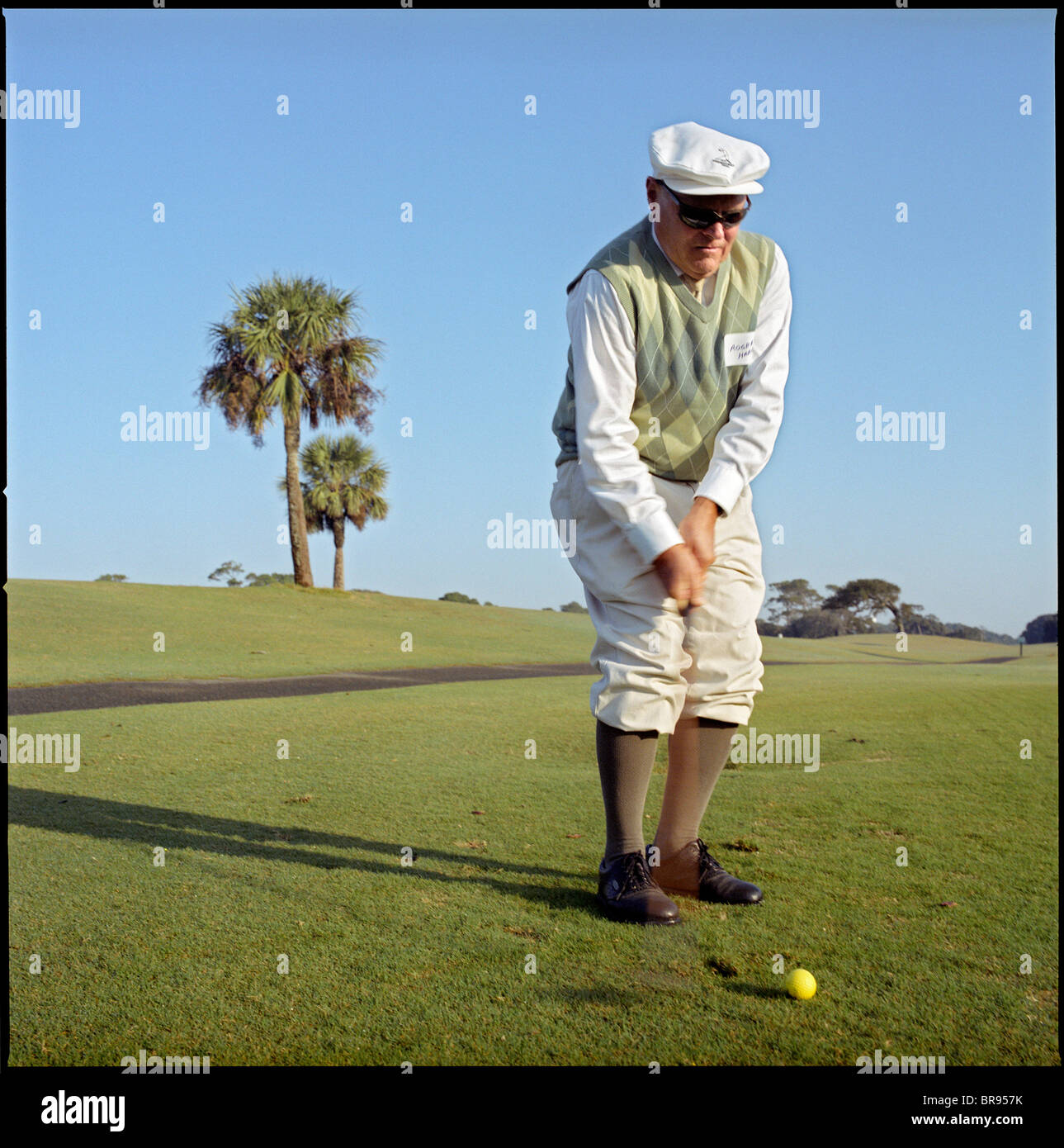 Playing Retro Golf with Hickory Clubs Stock Photo