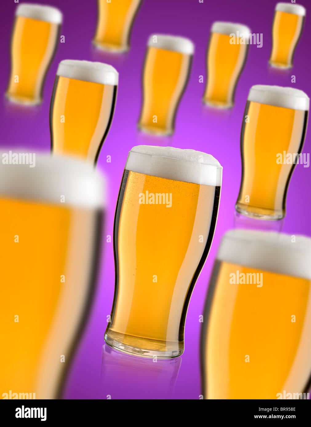 montage of lagers on a pinkish background Stock Photo