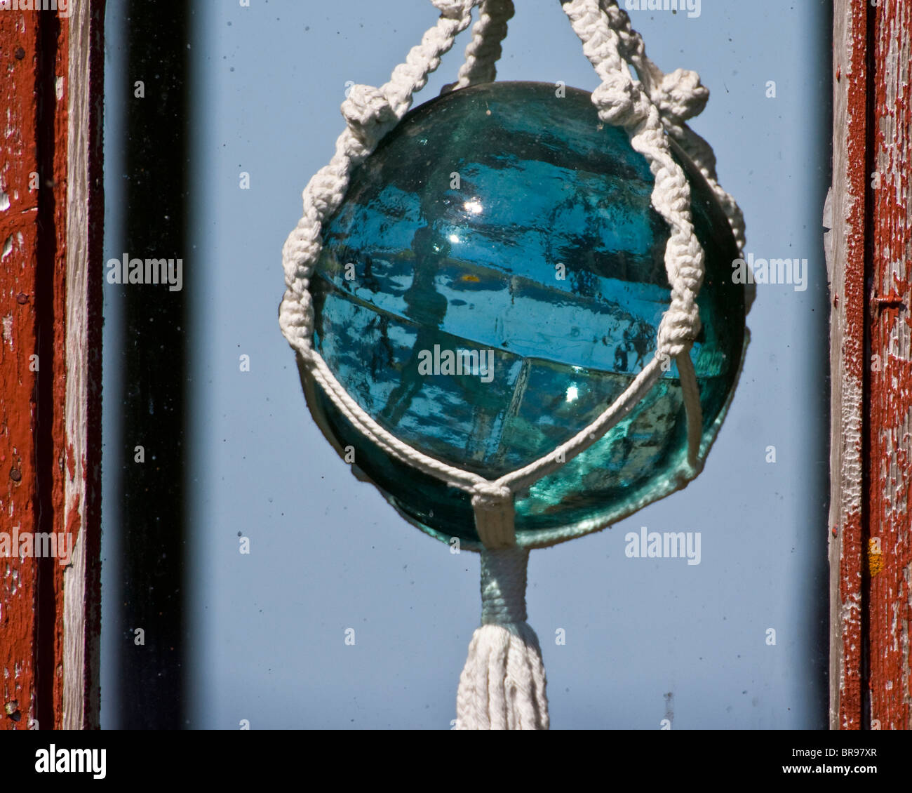 Antique Glass Fishing Net Floats on Glass Table Stock Photo - Alamy