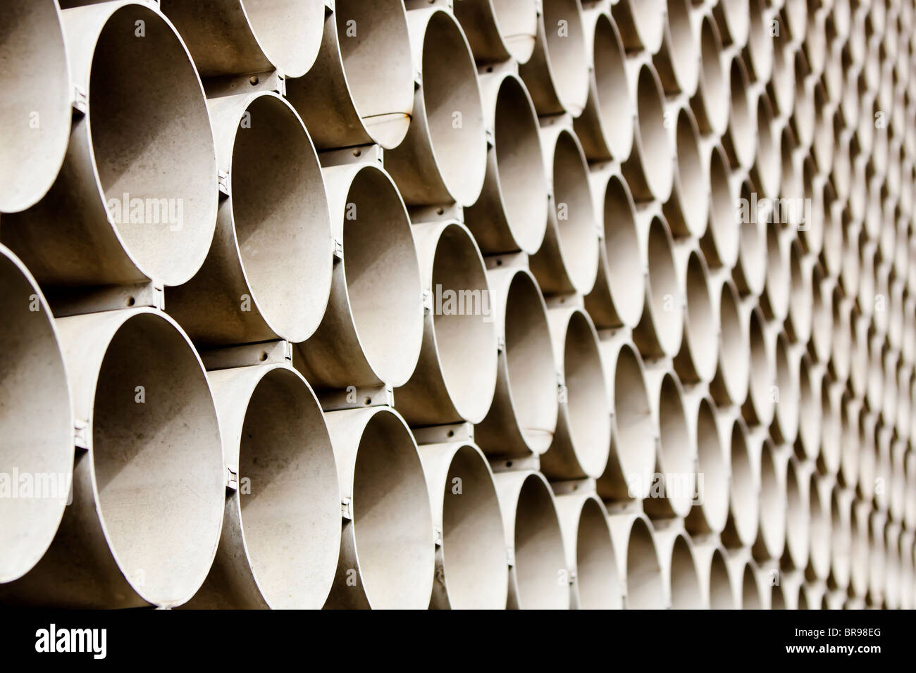 A wall of repeating circular shapes. Stock Photo