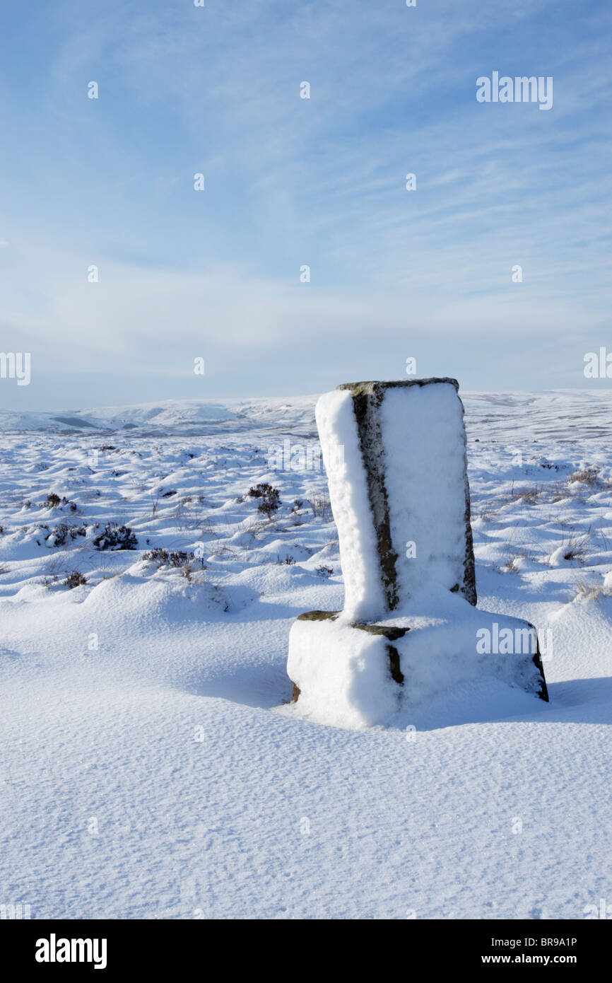 Commondale White Cross on a snow covered Commondale Moor during winter in North York Moors national park Stock Photo