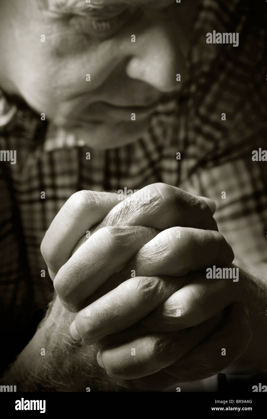 Praying old man hi-res stock photography and images - Alamy