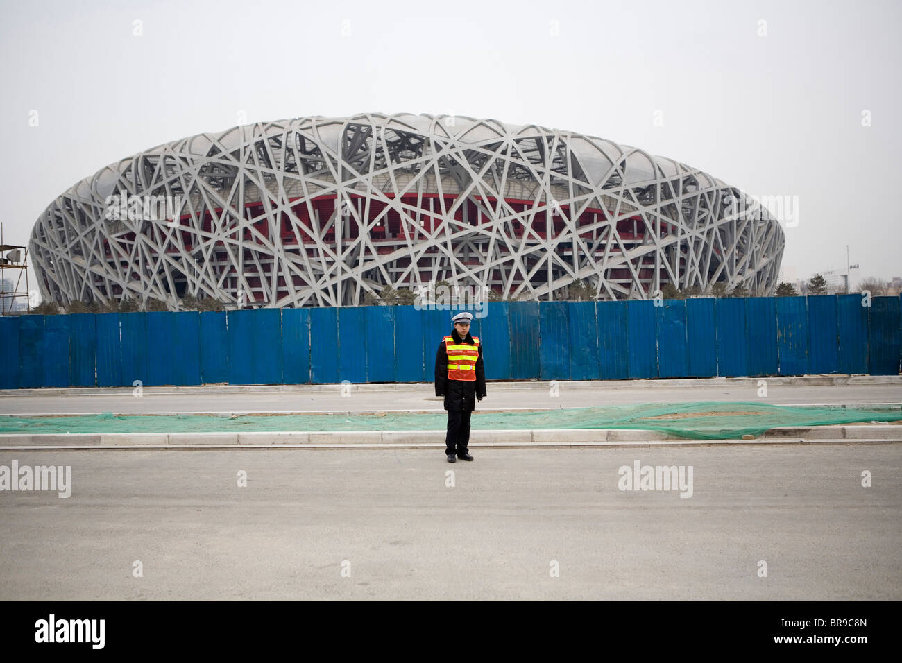 A guard in front of the Olympic Stadium Beijing China. Stock Photo
