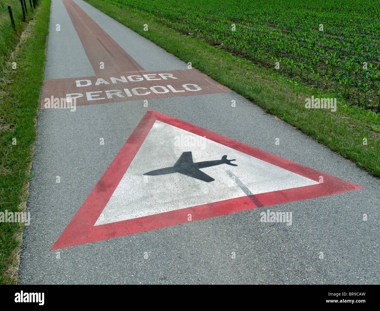danger warning sign of airplanes flying at low altidude - area of ...