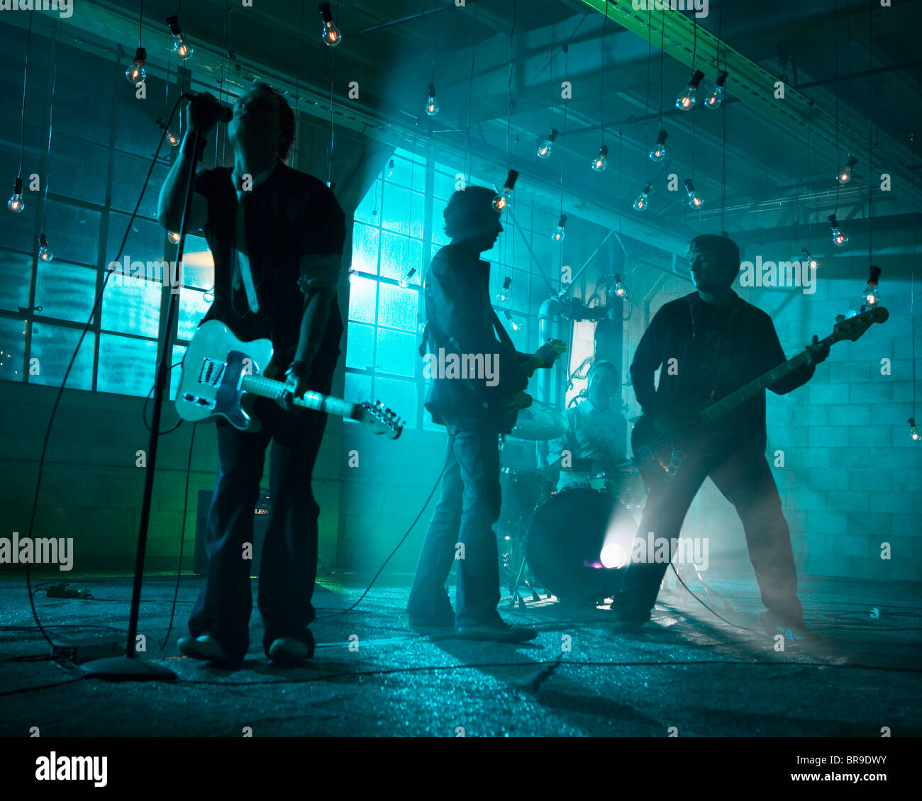 A four person rock band performing San Francisco California. Stock Photo
