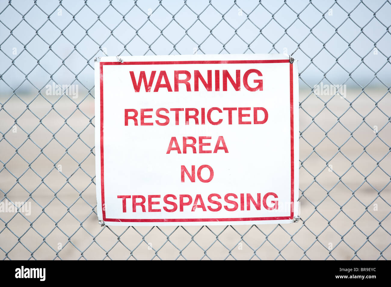 Warning Restricted Area No Trespassing Sign located at Port Columbus International Airport in Columbus Ohio Stock Photo