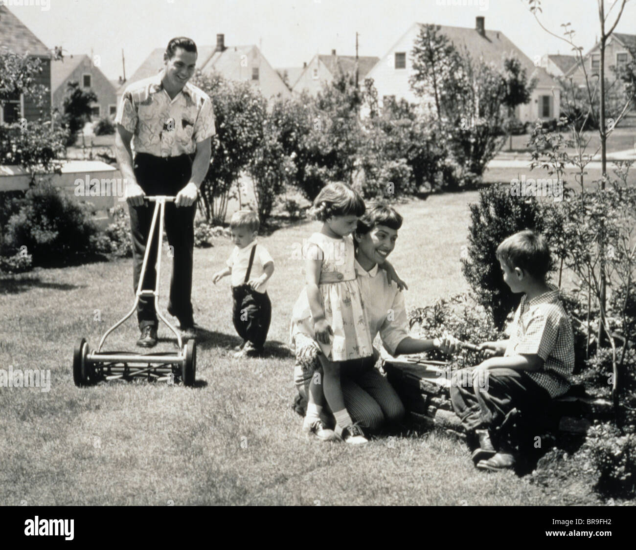 Mom son doing gardening home hi-res stock photography and images - Alamy