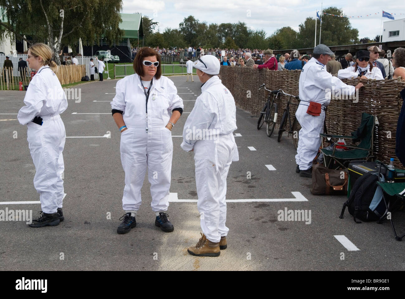 Women working in motor sport in the Pits. Traditionally a job a man would do. Goodwood Festival of Speed. Goodwood Sussex. UK. 2010, 2010s HOMER SYKES Stock Photo
