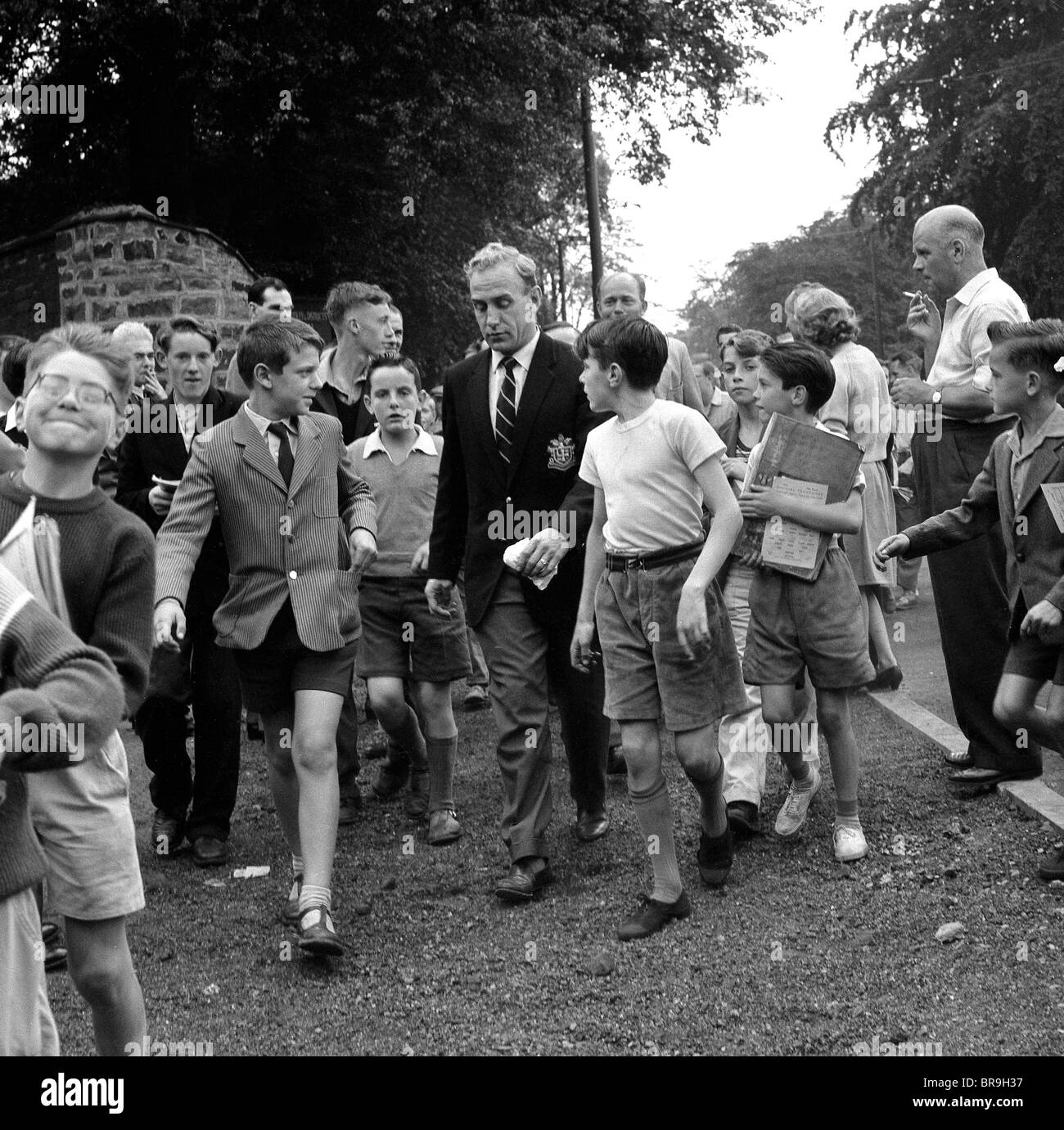 Wolverhampton Wanderers footballer Billy Wright walking to Molineux 