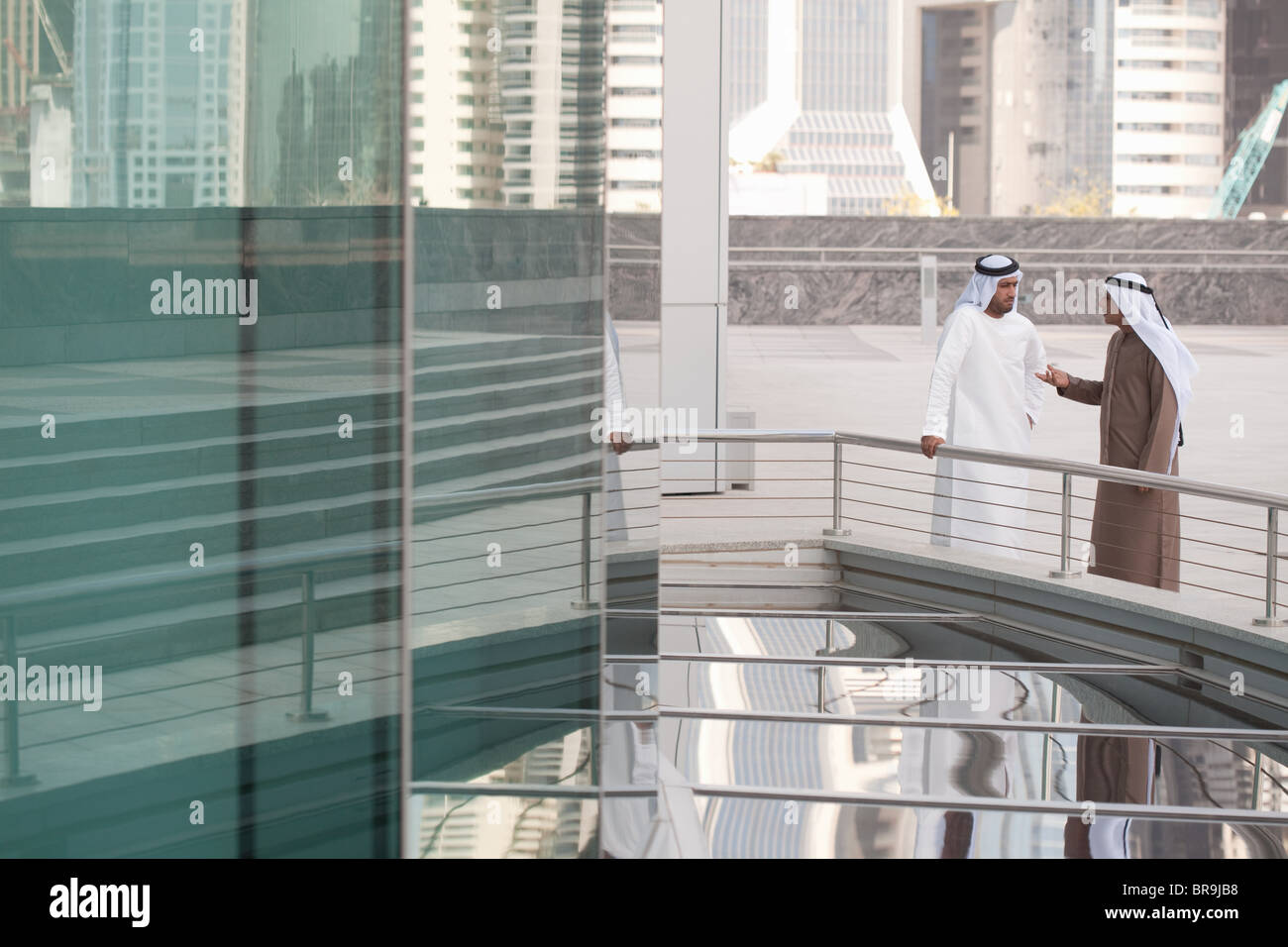 Middle eastern businessmen by office building Stock Photo