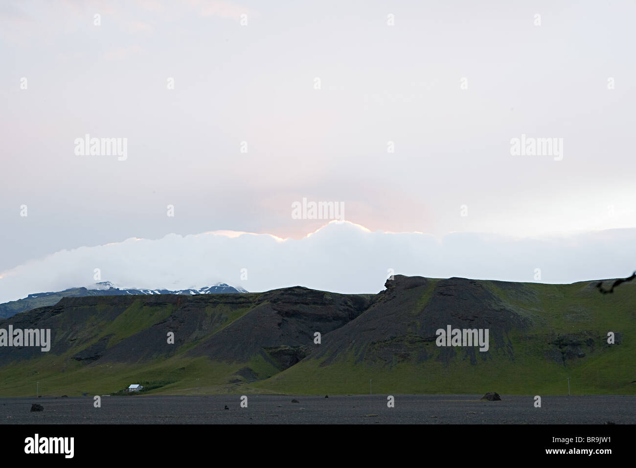 Iceland, sunset over volcanic mountains Stock Photo - Alamy