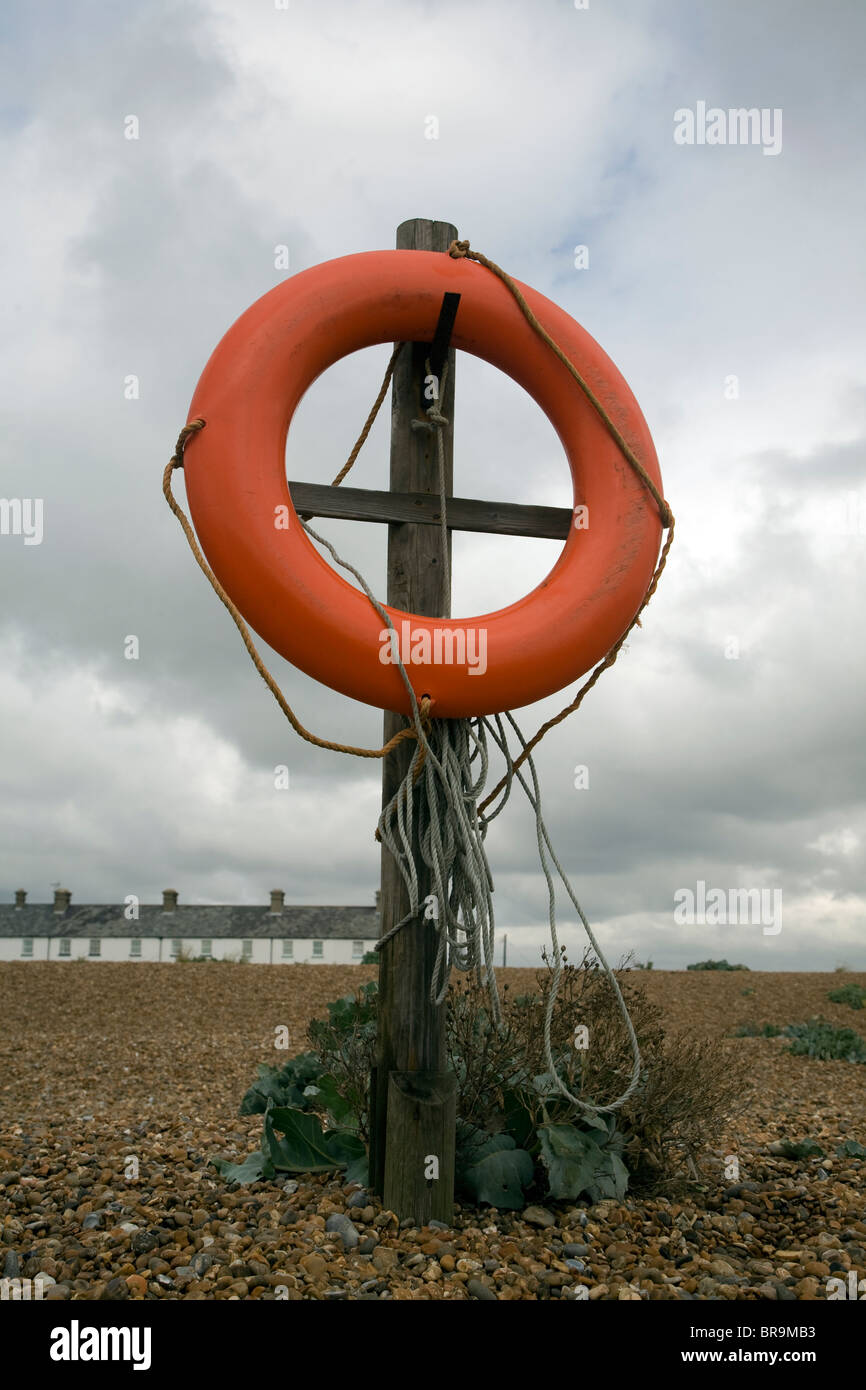 Red Rlifesaving Ring Red life saving ring Shingle Street beach, Suffolk, England Stock Photo ...