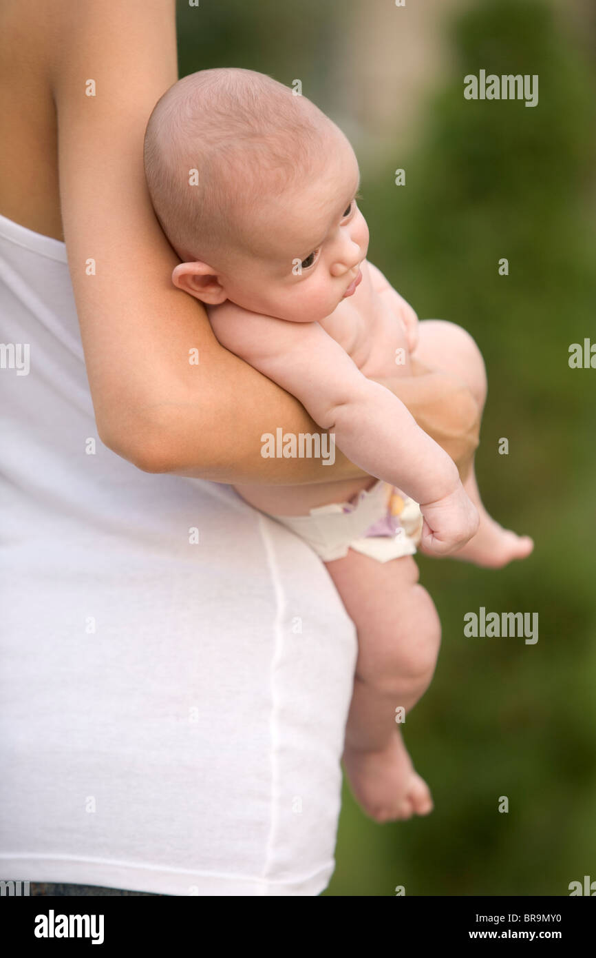 Mother stands holding baby hi-res stock photography and images - Alamy