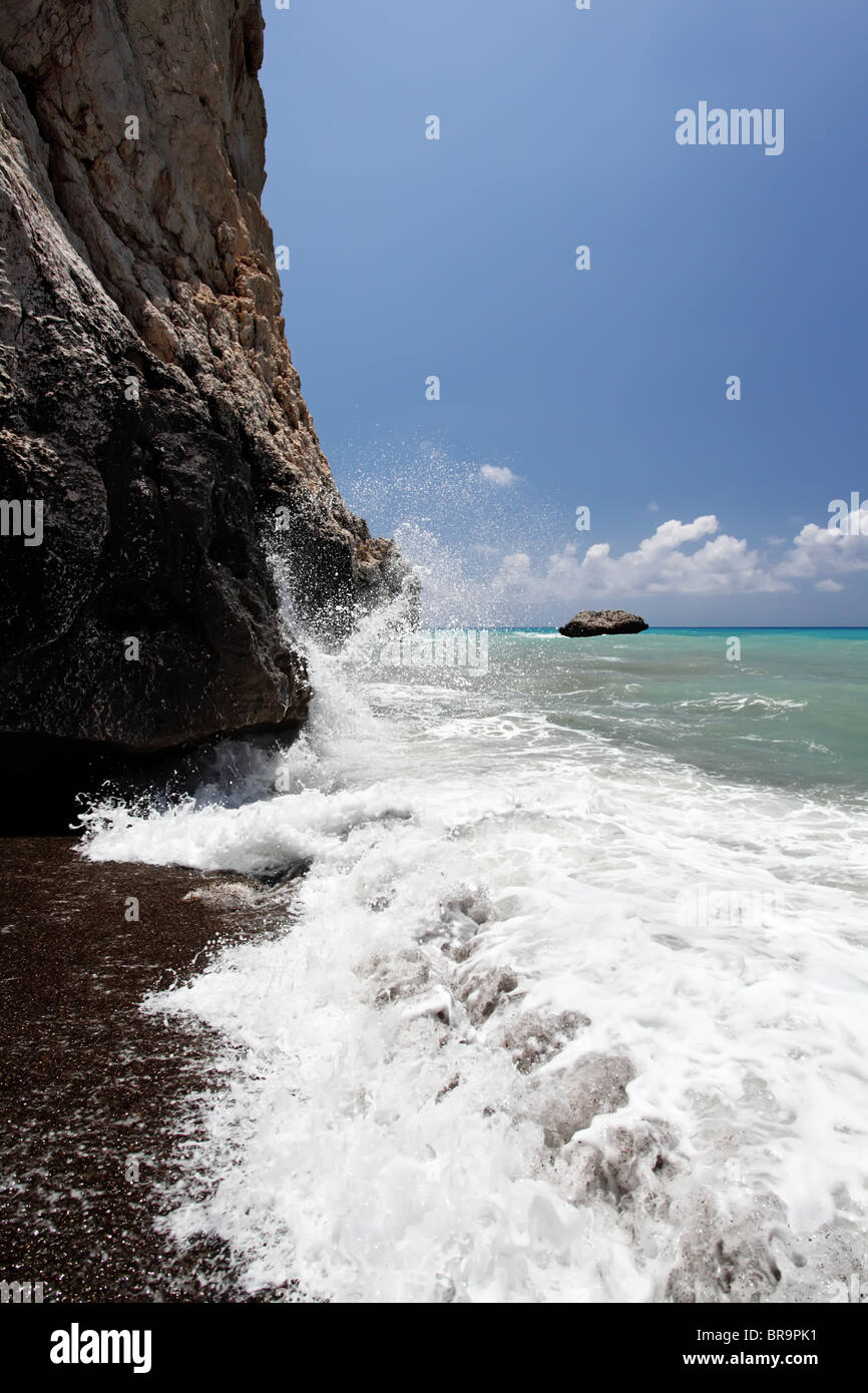 Waves and rocks. Petra Tou Romiou (near Paphos), birthplace of Aphrodite. Cyprus. Stock Photo