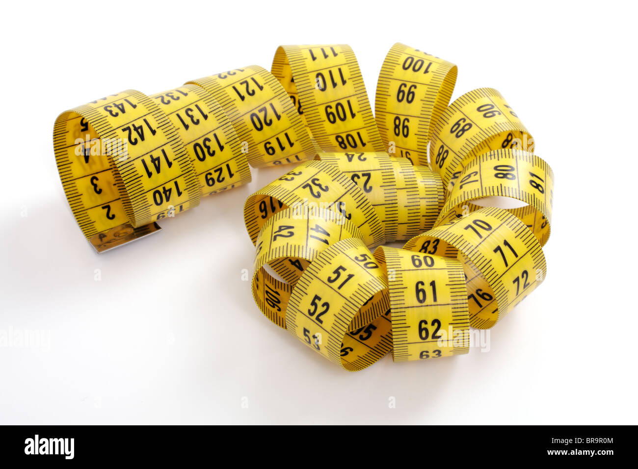 Tape measure isolated on a white background Stock Photo - Alamy