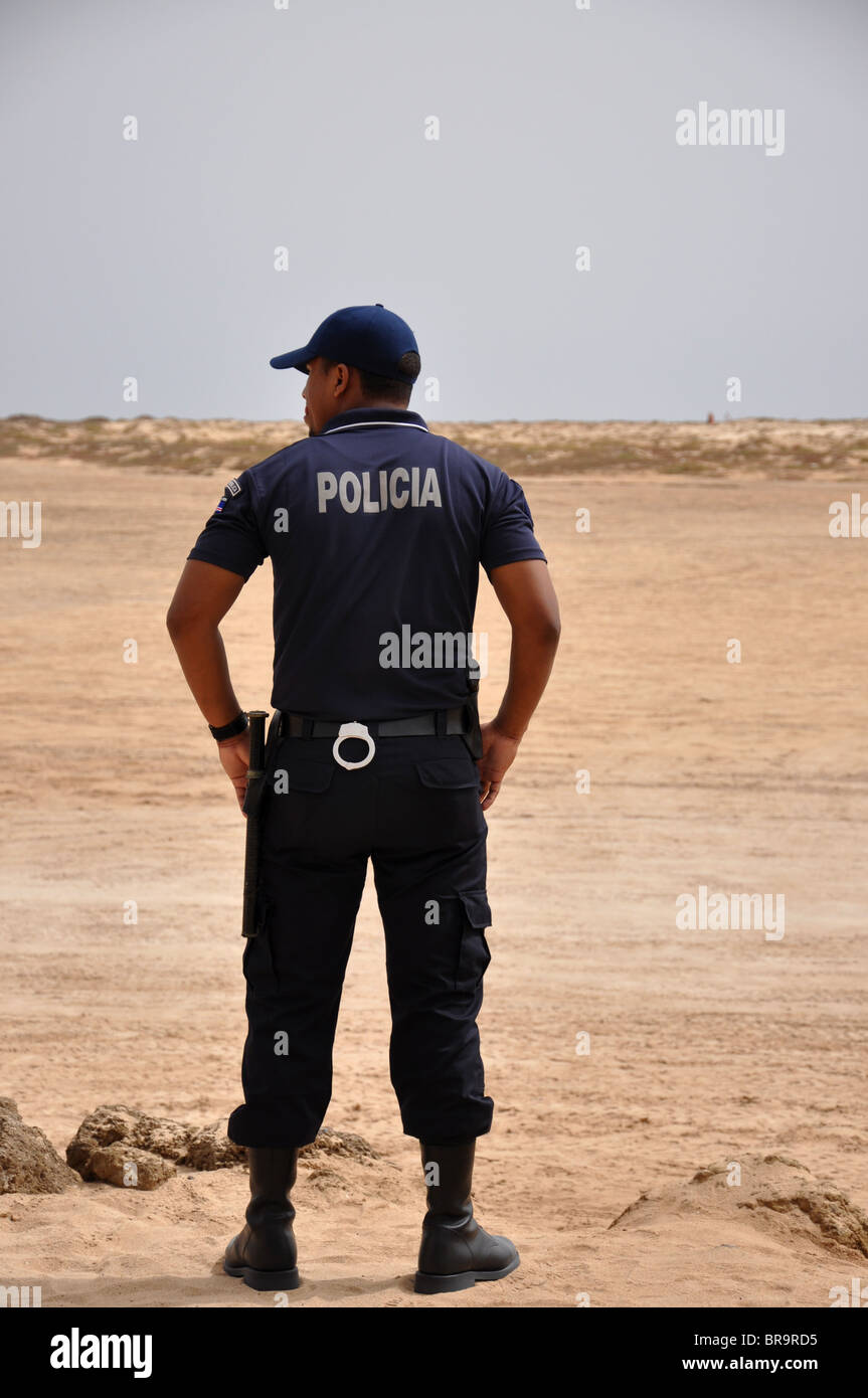 Policia Police man on duty at  Club Hotel Riu Garopa Stock Photo