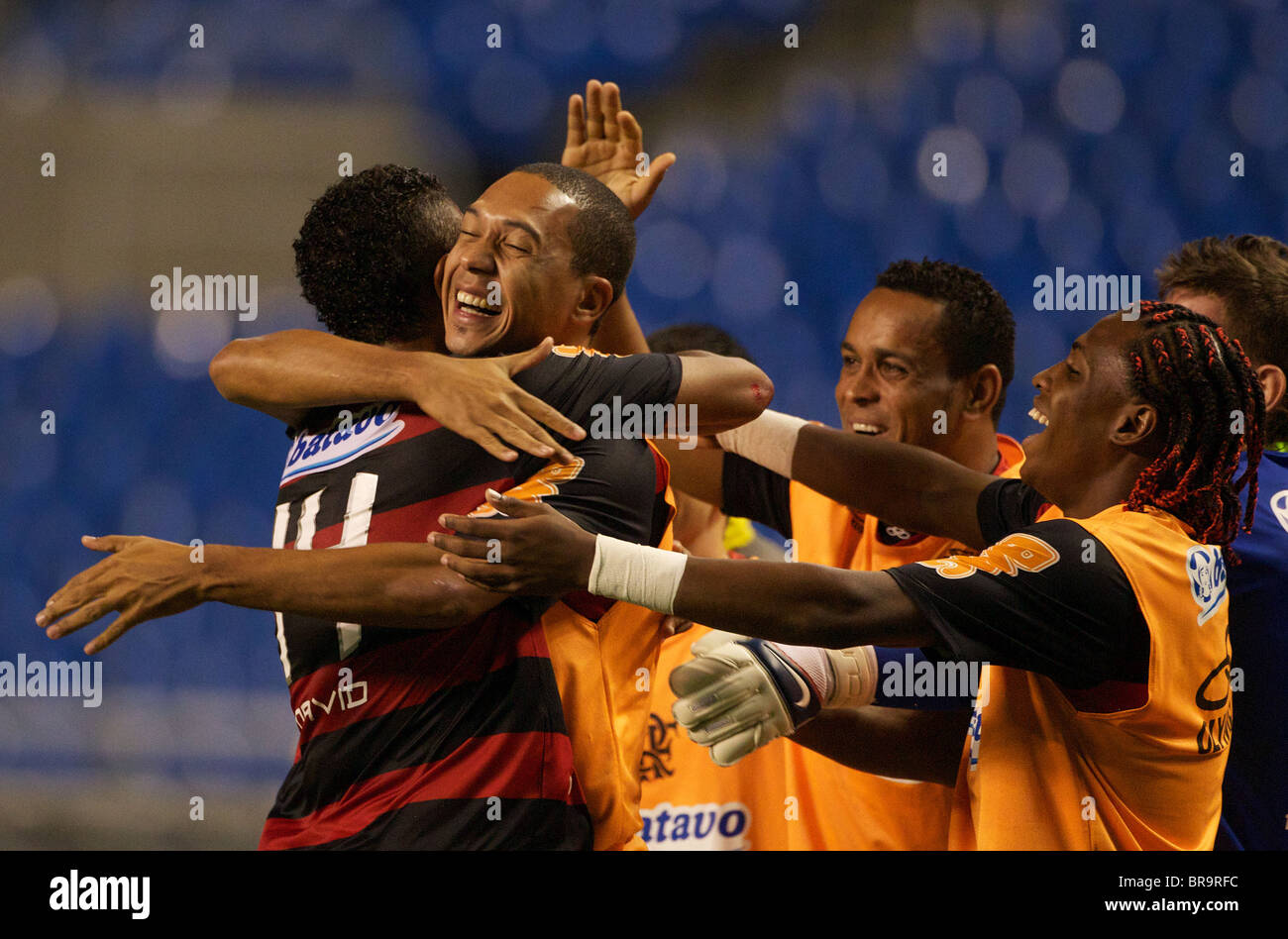 David is congratulated by team mates after scoring Flamengo's second goal during the Flamengo V Fluminense, football match. Stock Photo