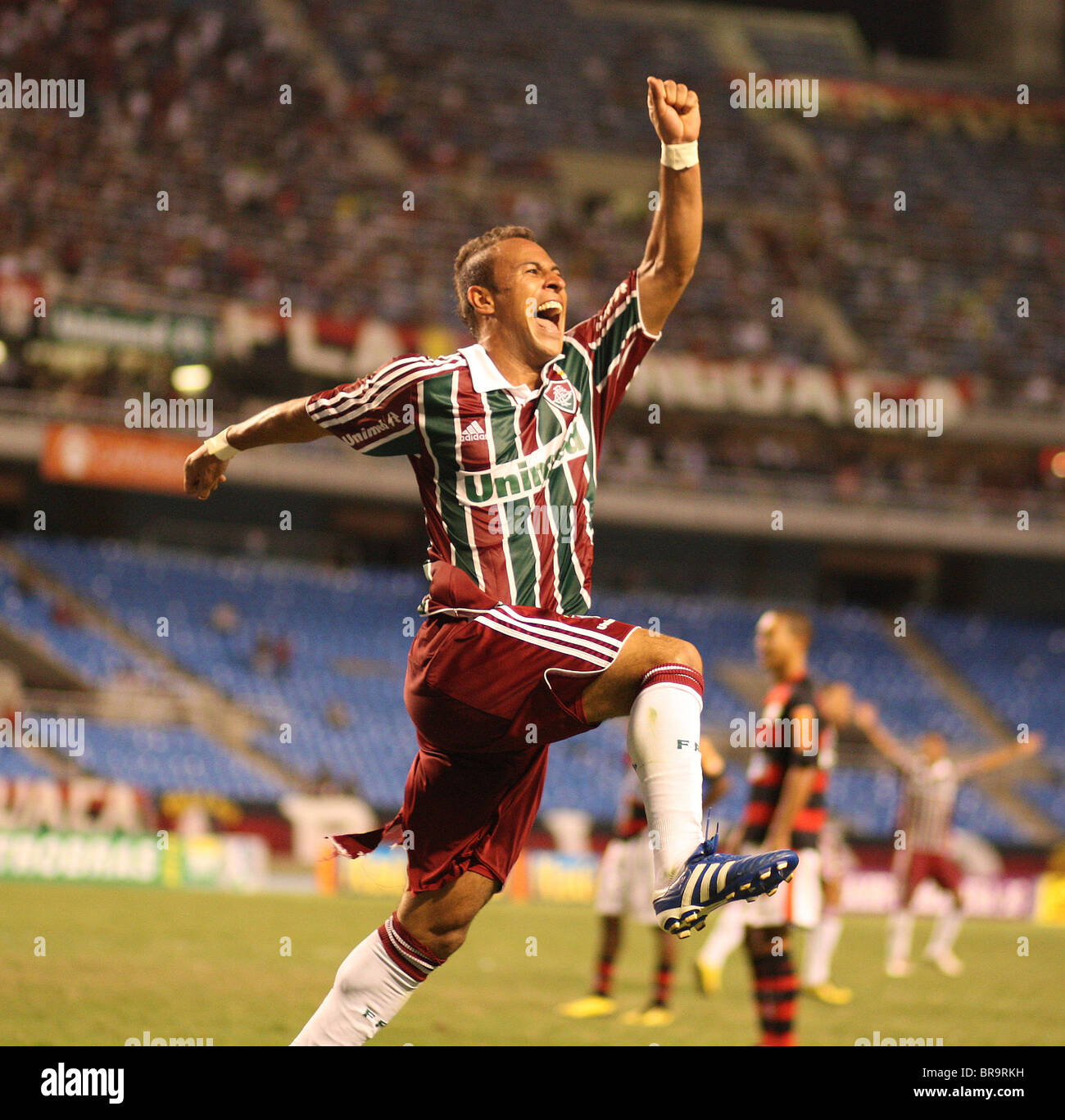 Fluminense striker Rodriguinho celebrates after scoring his sides third goal during the Flamengo V Fluminense, Football match. Stock Photo