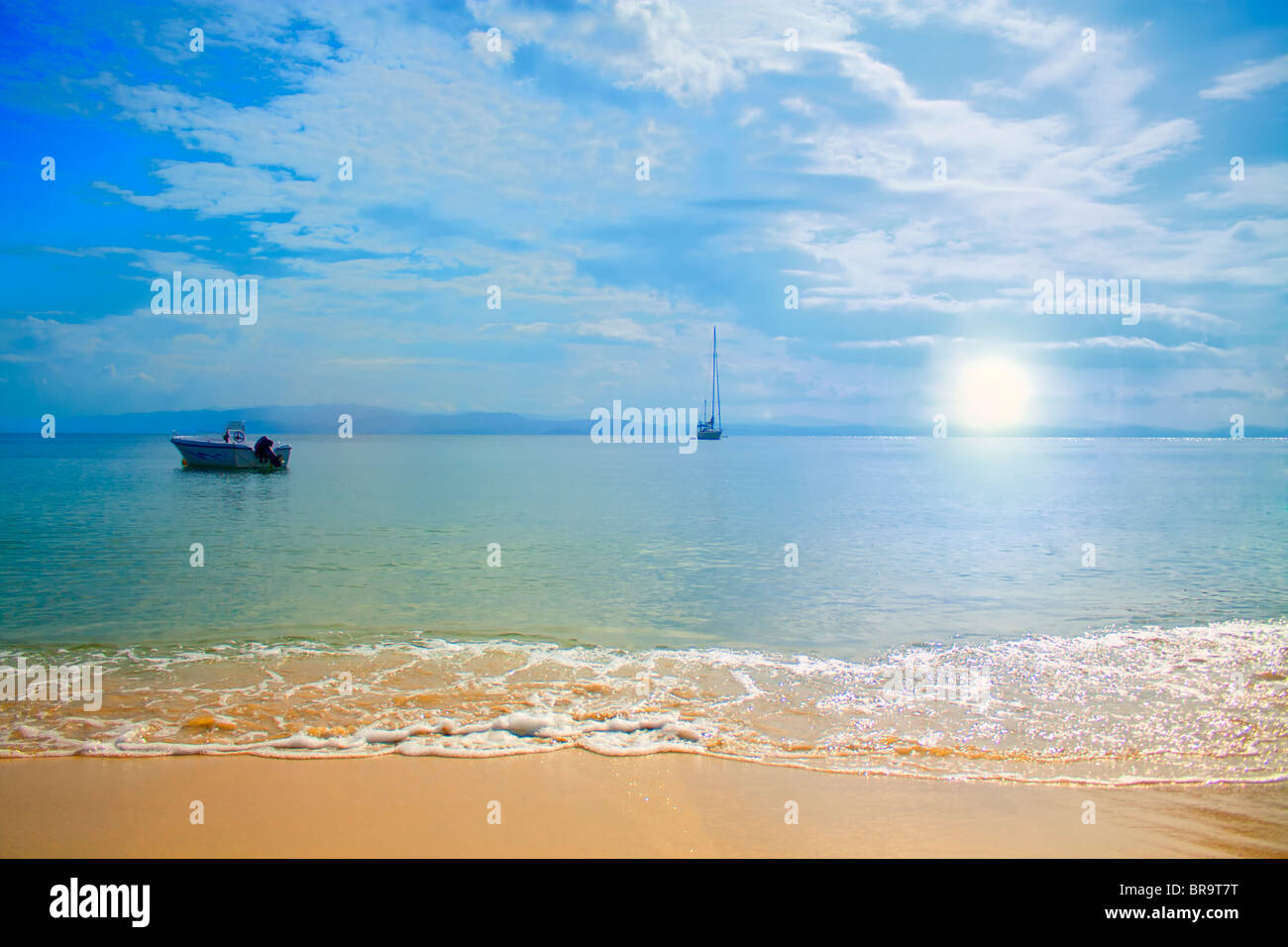 Beautiful serene beach at sunset, calm sea Stock Photo Alamy