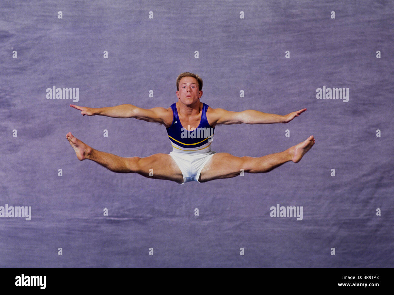 Male gymnast performing on the floor exercises Stock Photo Alamy