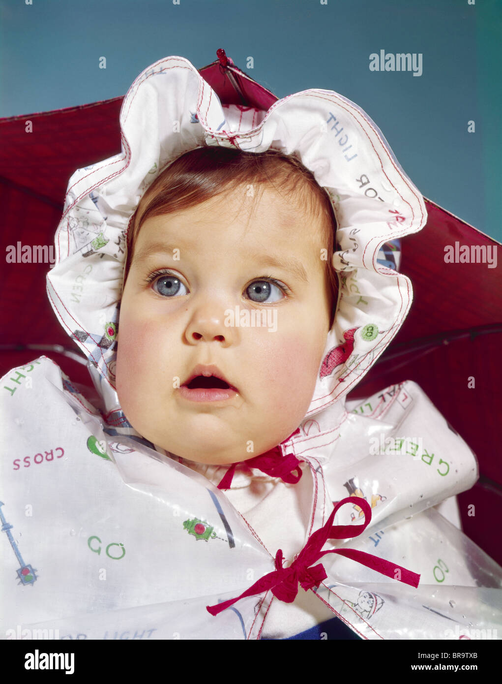 1960s BABY WEARING RAINCOAT AND HAT Stock Photo Alamy