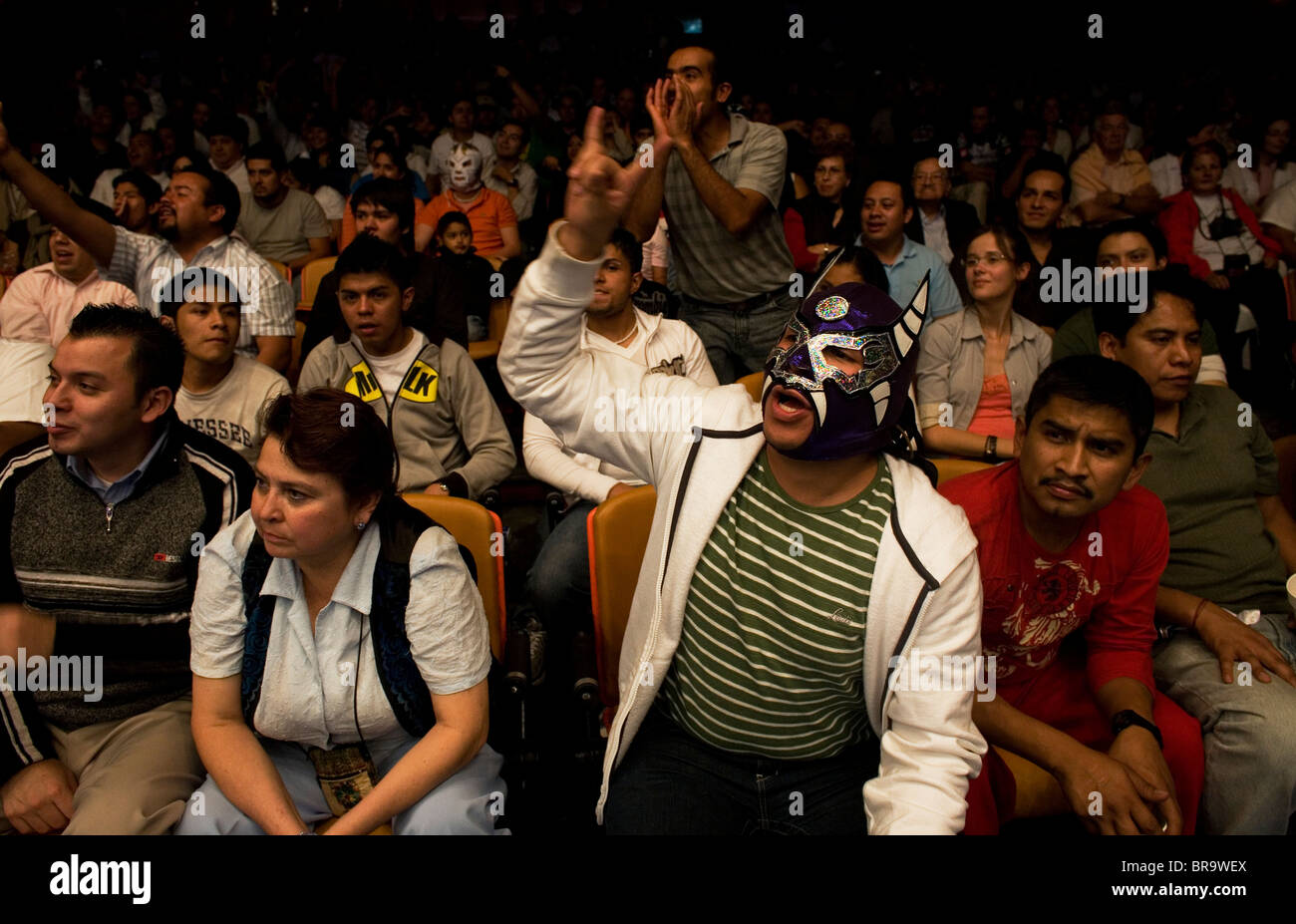 A fan cheers during a Lucha Libre fight in Arena Mexico Mexico City