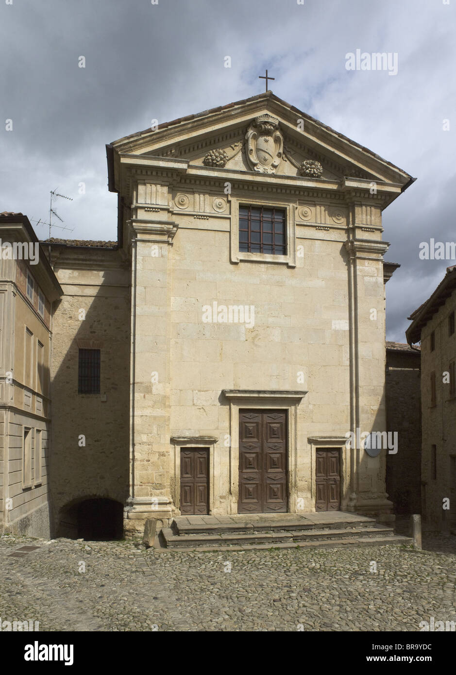 Vigoleno, near Parma, Italy. Oratorio della Madonna delle Grazie. Eighteenth century facade overlooking main square. Stock Photo