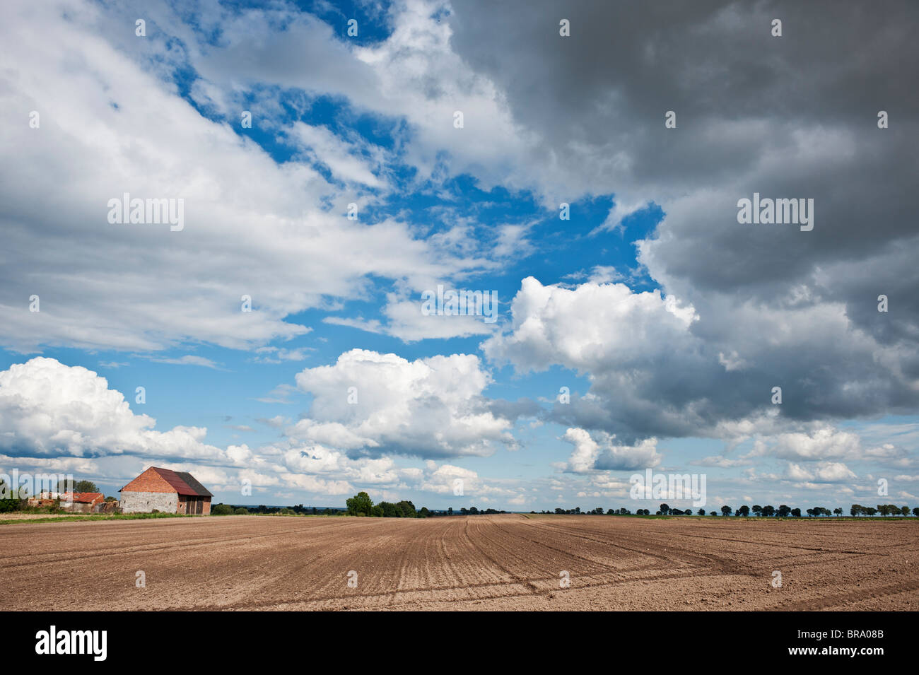 Newly plowed farm field in summer, Smicz, Prudnik, Southern Poland Stock Photo