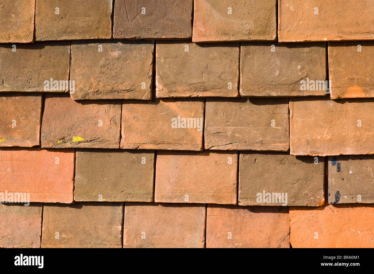 Red clay roofing tiles. Stock Photo